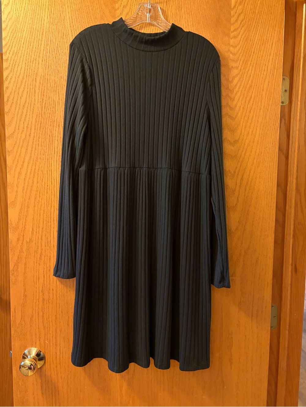 So brand long sleeve black ribbed dress. Size XL